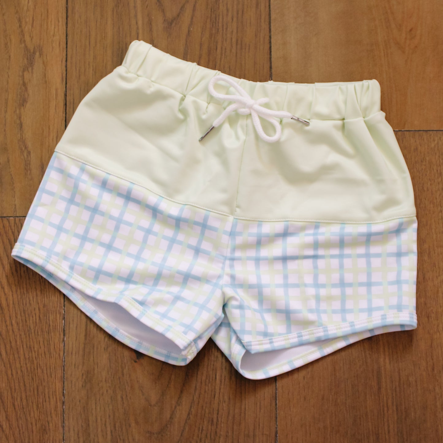 Yellow and blue gingham swim trunks
