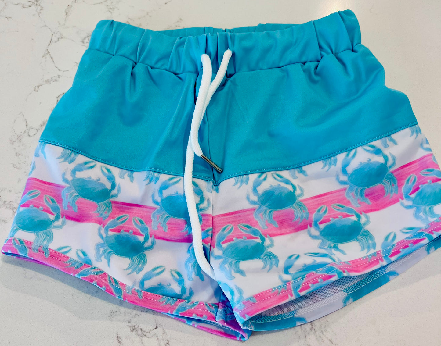 Teal Crabs Swim