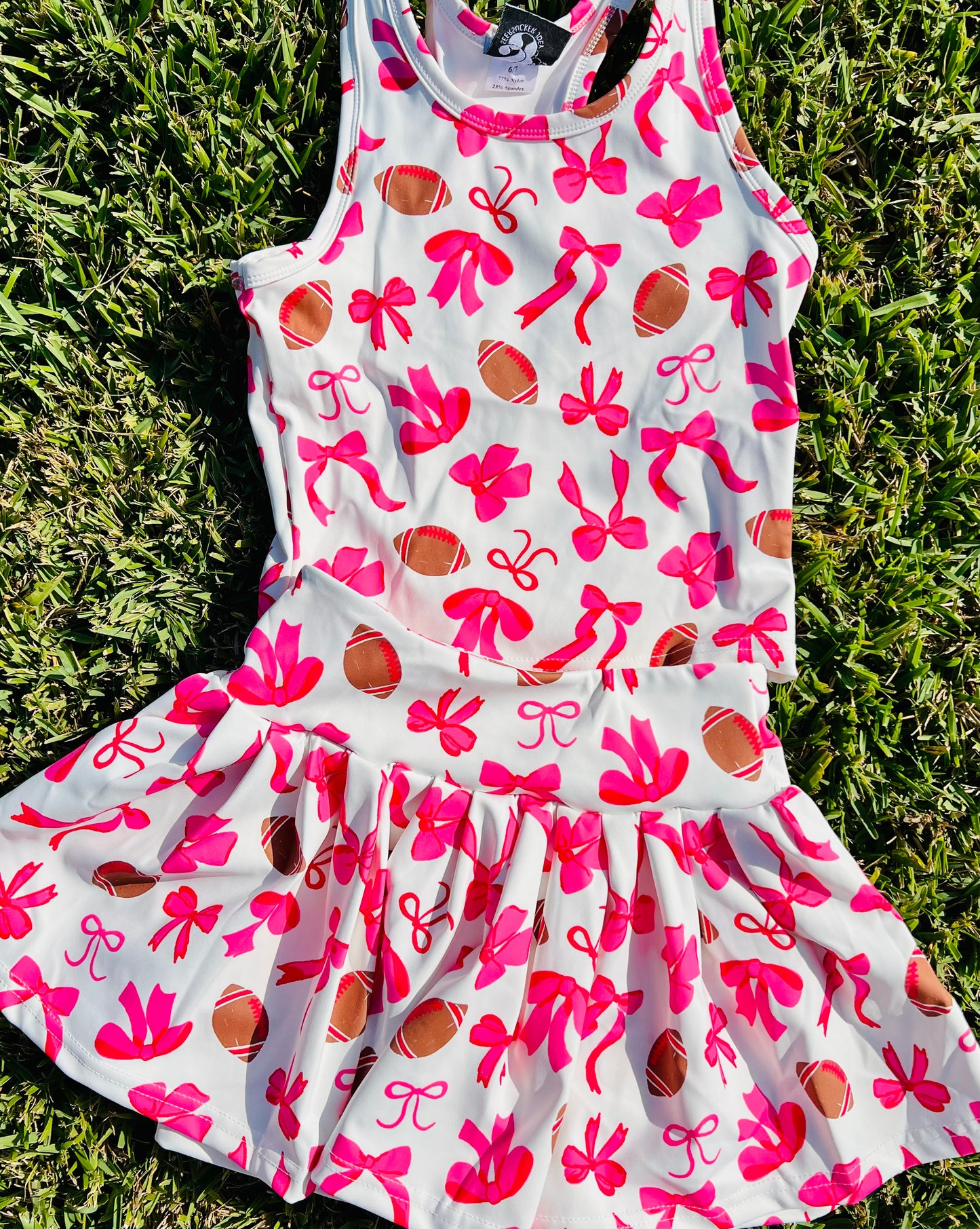 Pink bows and footballs