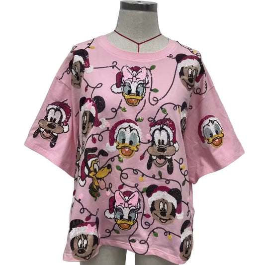 Pink Christmas tee eta Sept
